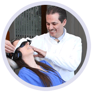 Dr Victor Muradian with a patient